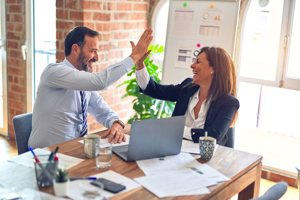 Professional team collaborating in a bright office meeting