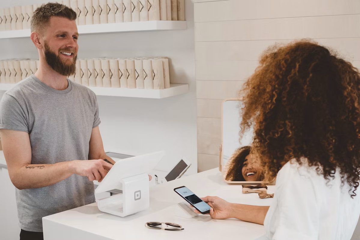Retail checkout counter with a point-of-sale terminal
